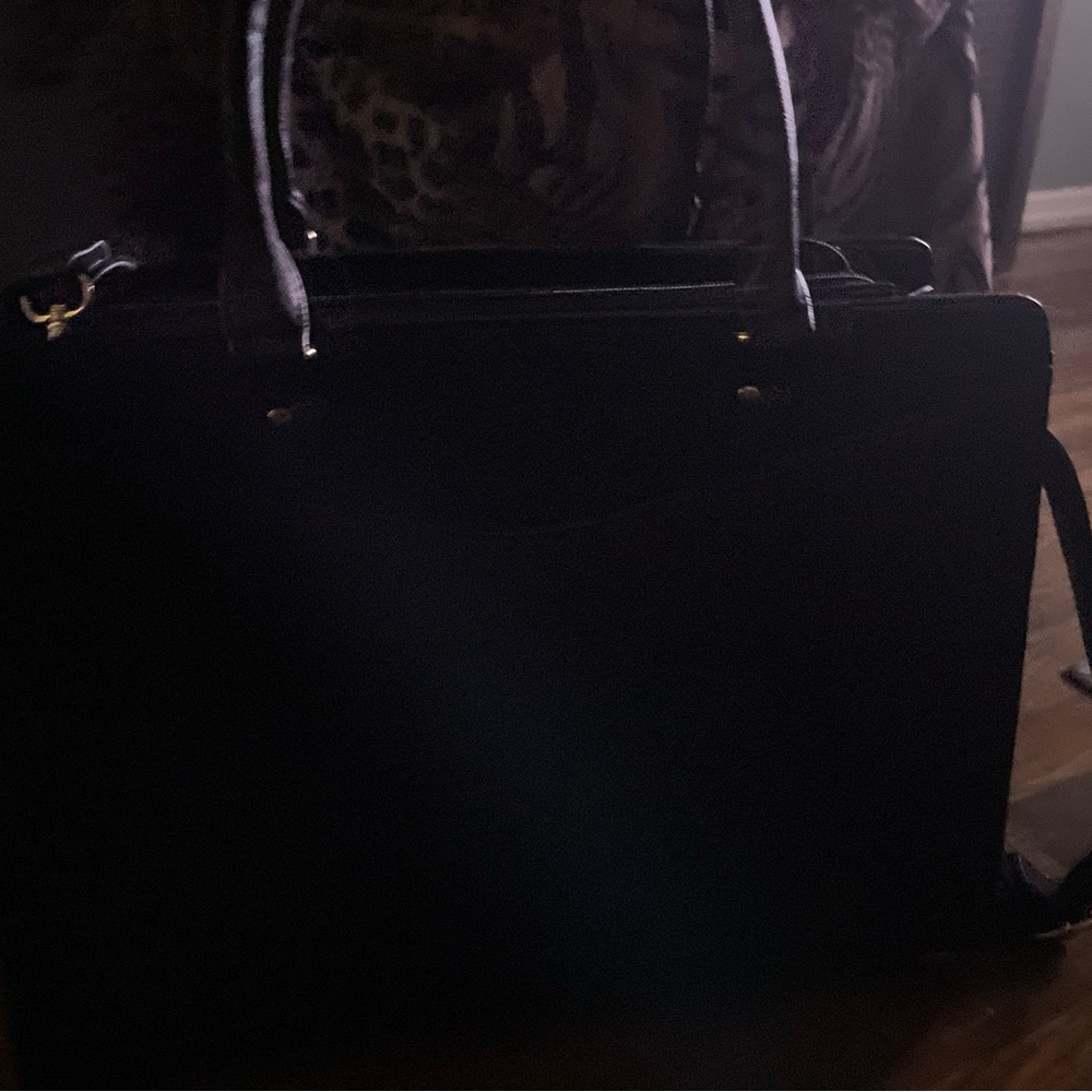 Black Laptop Bag with Structured Design and Minimalist Aesthetic
